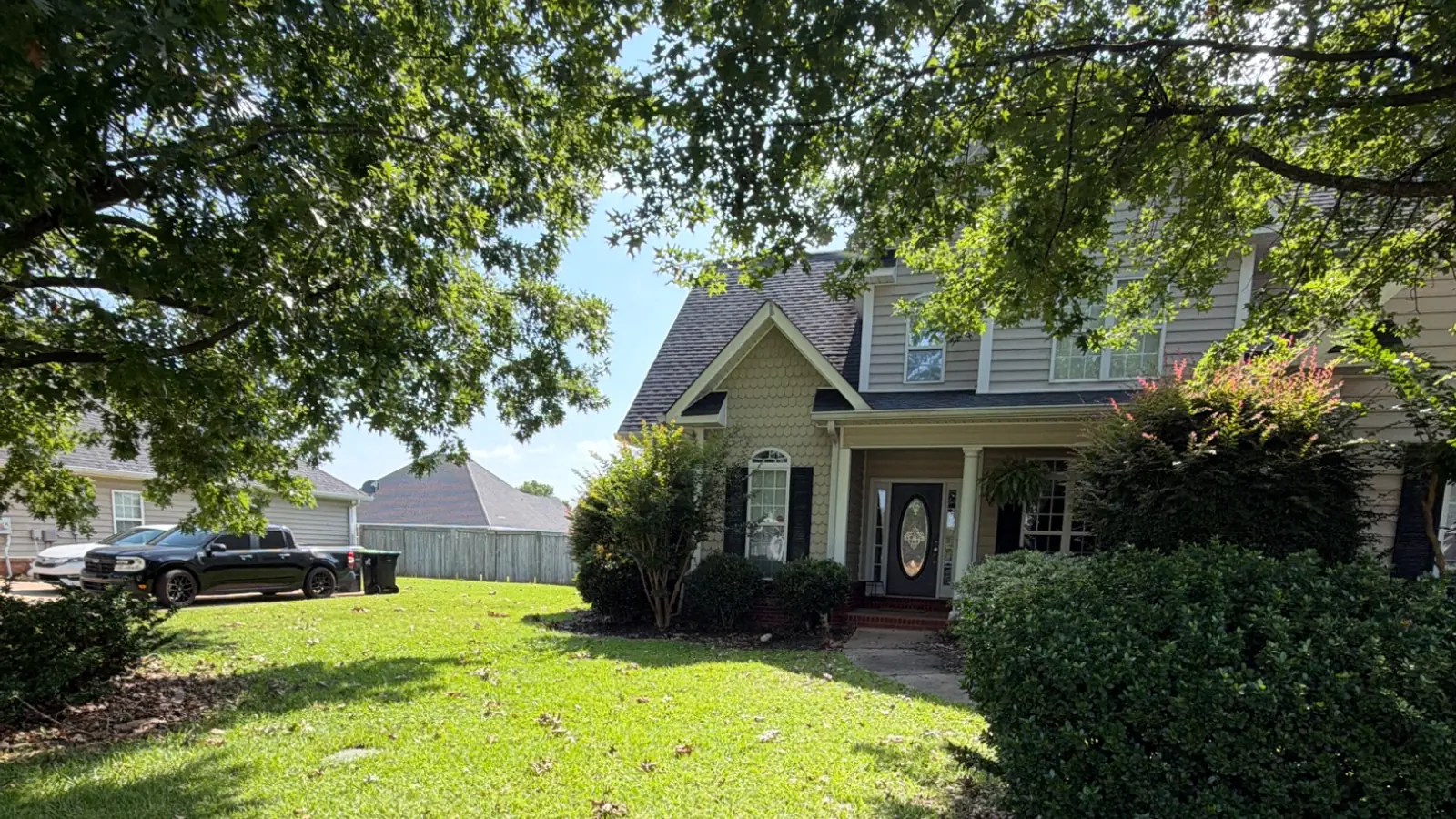 Thick green lawn in front of an Attaboy Lawn Care customer's home in Middle Georgia